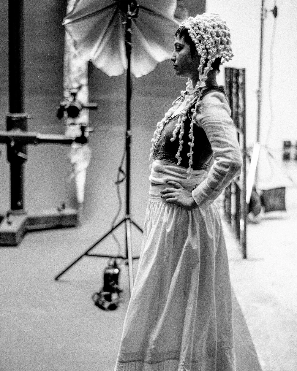 model posing for the lookbook. BTS picture of Evade House